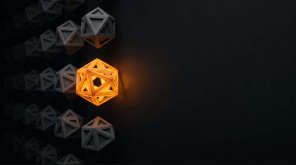 One glowing amber icosahedron leading a formation of dim grey icosahedrons on a dark background — the one business AI actually recommends